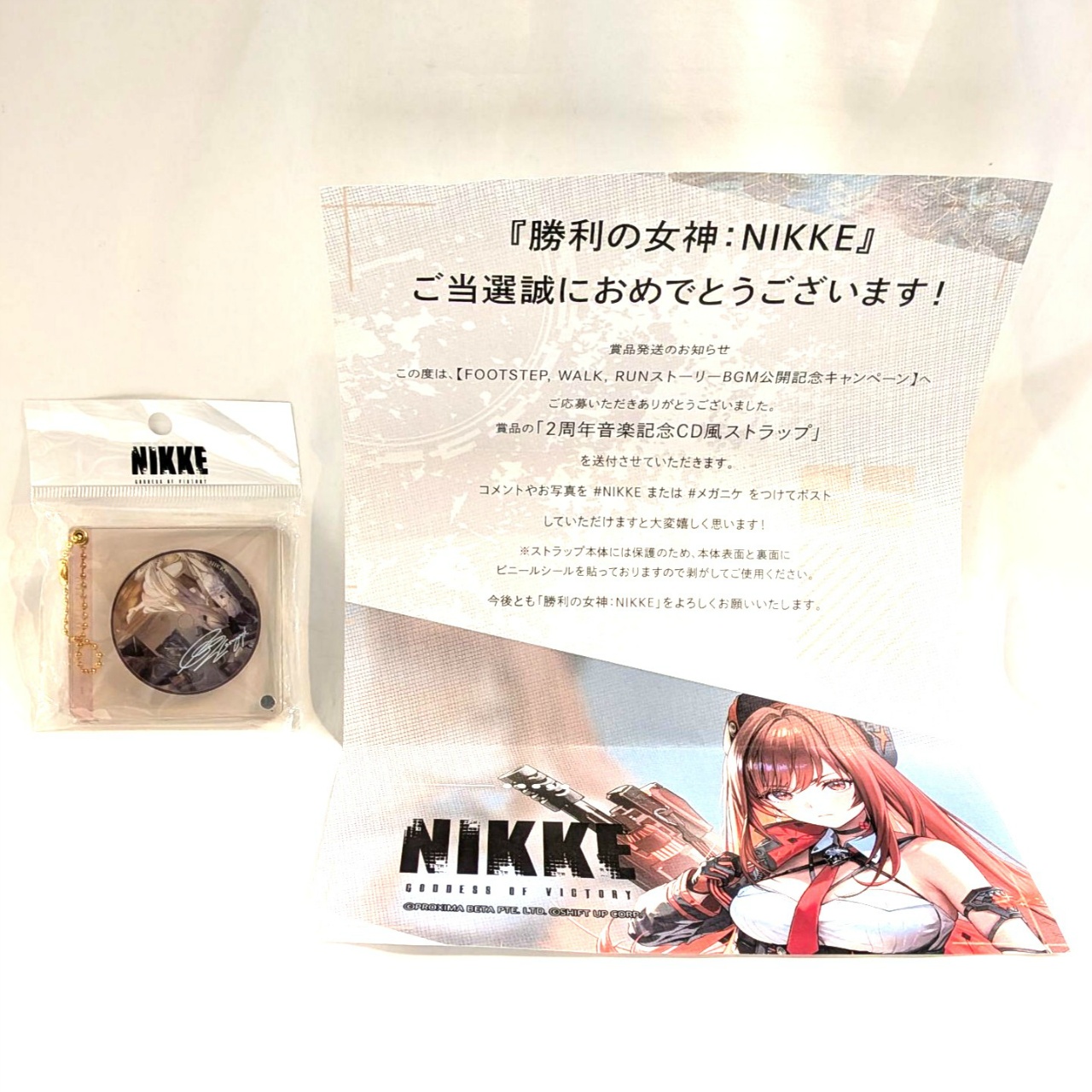 Goddess of Victory NIKKE [FOOTSTEP, WALK, RUN Story BGM Release Commemoration Campaign] 2nd Anniversary Music Commemorative CD-Style Strap Winning item